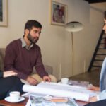 How can you compare custom home builders before signing a contract?
